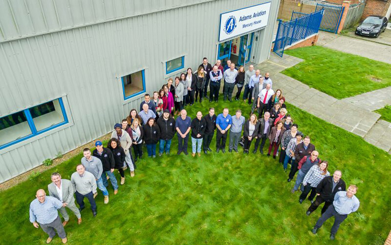 The Adams Aviation team celebrating 50 years in the aviation trade supplier market
